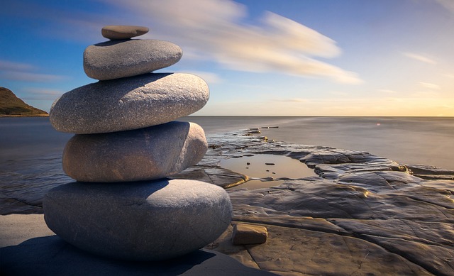 alt= "zen stones balancing to represent life purpose "